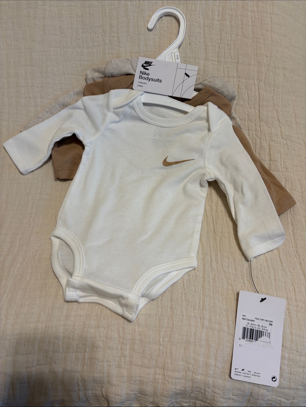 Nike White Long-Sleeve Baby Bodysuits with Tan Swoosh (set of 3) size 3m
